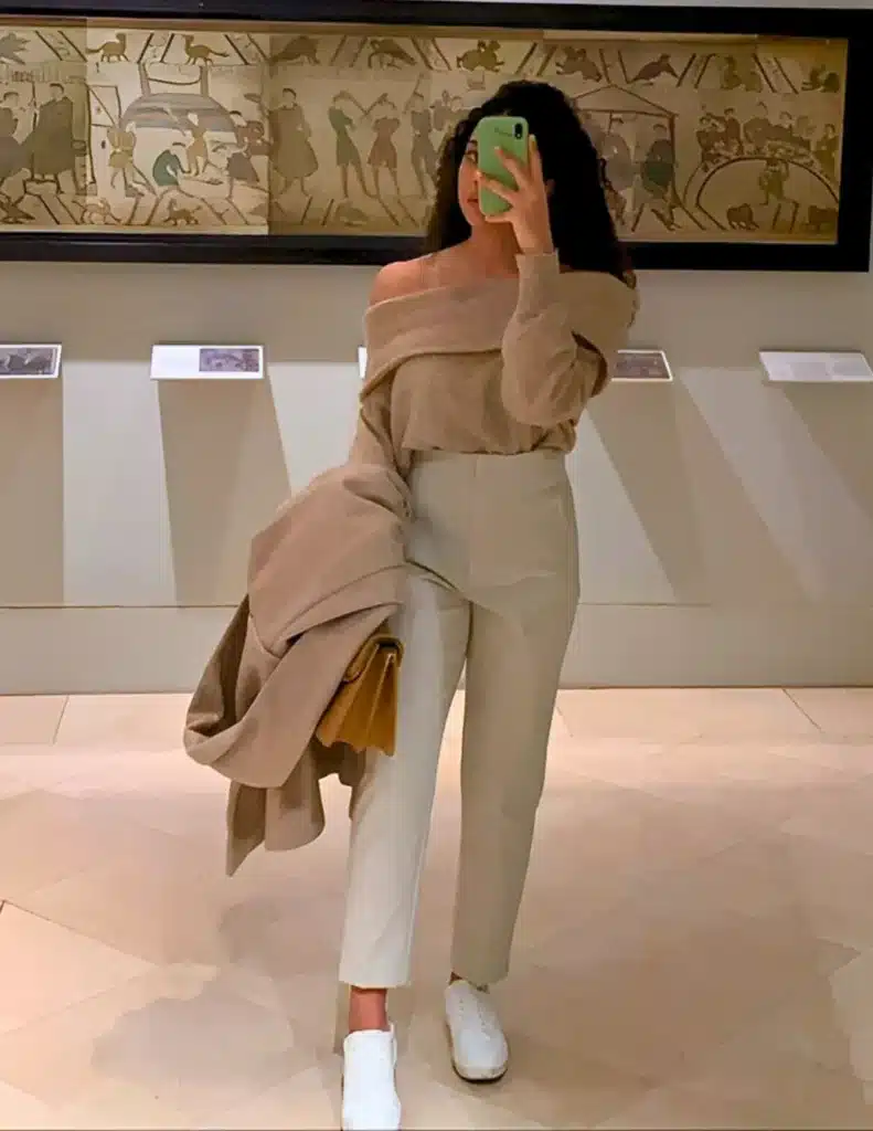neutral french outfit idea with trousers and sneakers