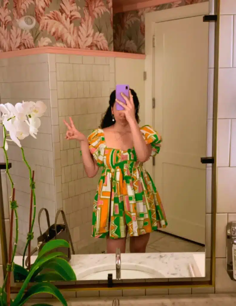 Woman wearing multicolored mini dress