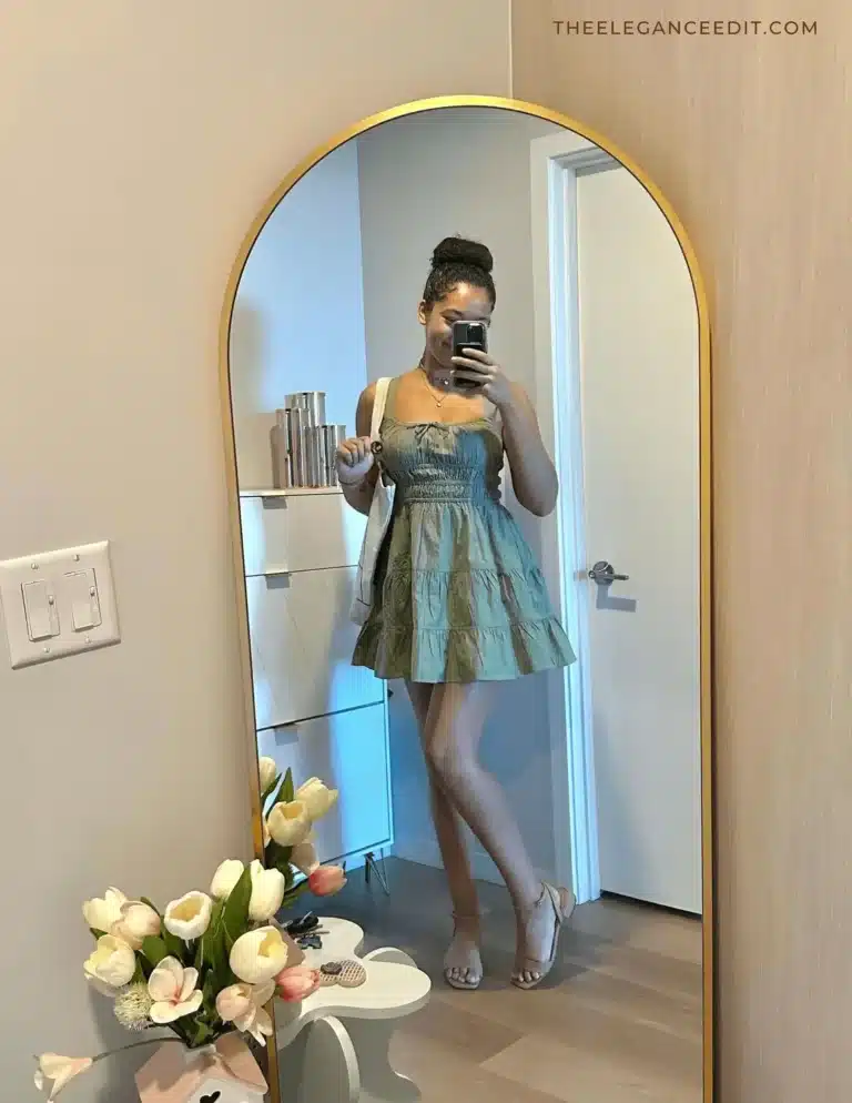 woman in green dress and flat sandals capsule wardrobe