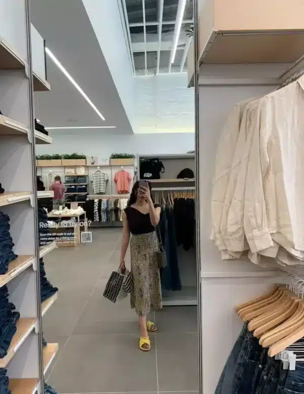 woman shopping for capsule wardrobe items