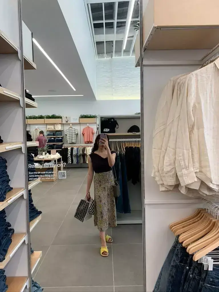 woman shopping for capsule wardrobe items