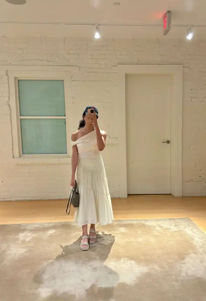 woman in reformation clothing shopping for jenni kayne dupes