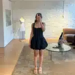 petite woman shopping for little black dress
