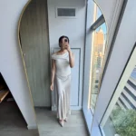 Quince Review woman in silk maxi skirt