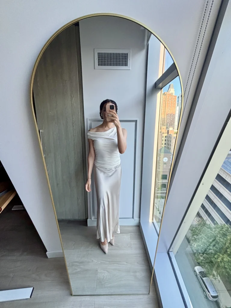 Quince Review woman in silk maxi skirt 