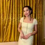 Woman in Amanda Uprichard skirt set from BNTO clothing rental