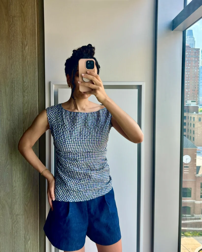 woman in klint studio gingham top