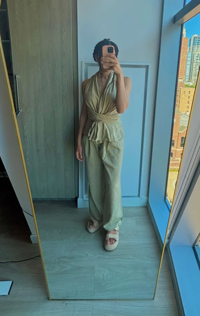 Woman in mirror wearing Solene pants and top