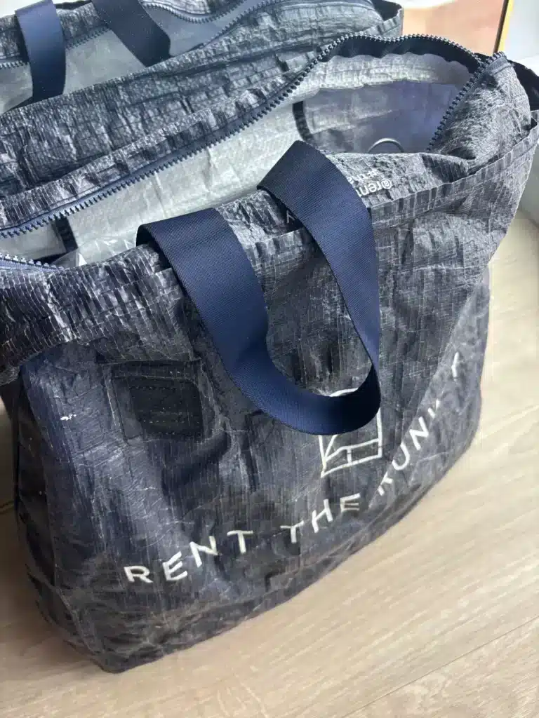 rent the runway navy blue bag
