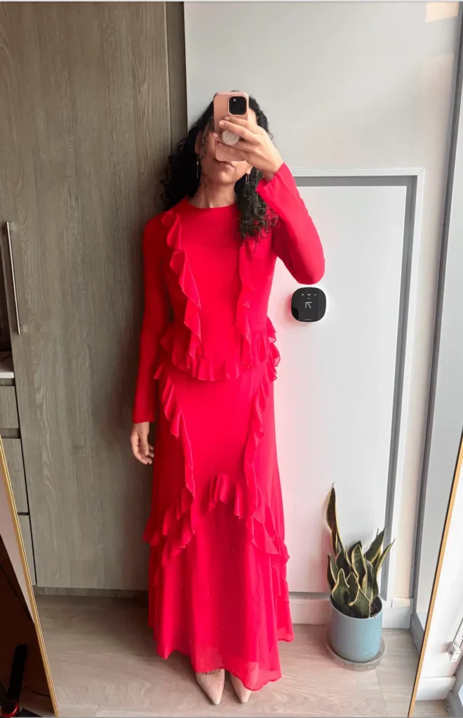 rent the runway review woman wearing a red gown